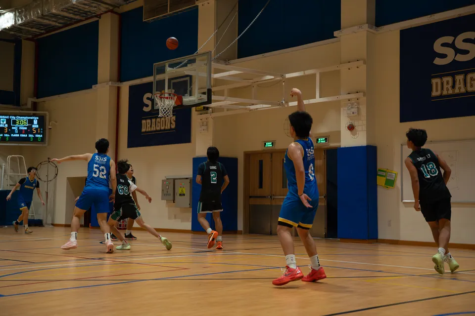 Indoor basketball game in progress