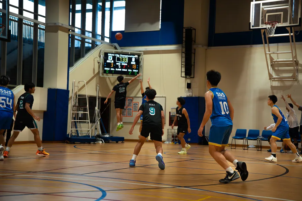 Indoor basketball game in progress