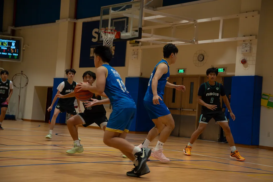 Indoor basketball game in progress