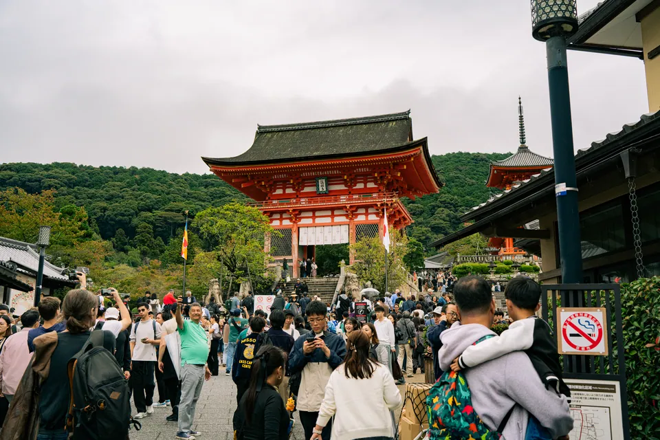 Temple gate with a crowd of visitors below it